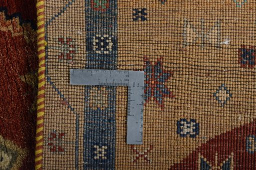 Surface texture of 2000s Persian Gabbeh rug with natural Wool and intricate pattern