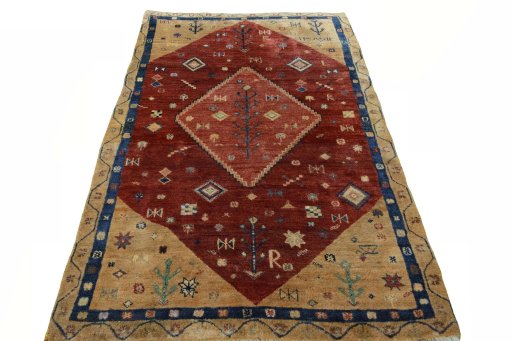 Surface texture of 2000s Persian Gabbeh rug with natural Wool and intricate pattern