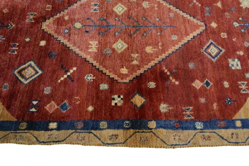 Full view of 2000s Persian Gabbeh rug from Iran / Persia, 199 × 118 cm in Red tones