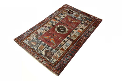 Corner detail of 2000s Persian Gabbeh rug showing border pattern and Wool pile