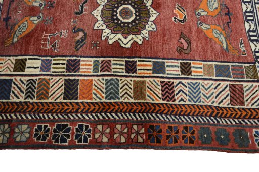 Full view of 2000s Persian Gabbeh rug from Iran / Persia, 161 × 106 cm in Red tones