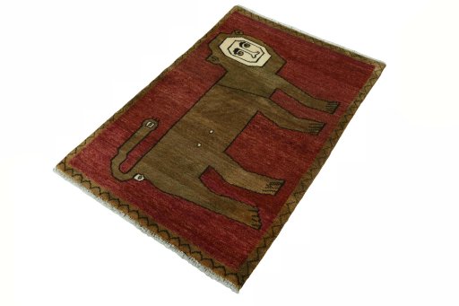 Corner detail of 2000s Persian Gabbeh rug showing border pattern and Wool pile