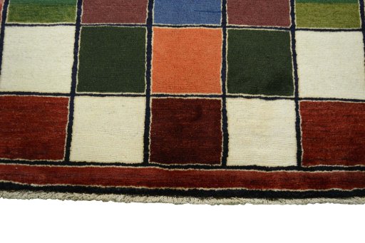 Central medallion detail of 2000s Persian Gabbeh rug from Iran / Persia