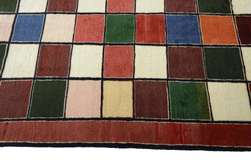 Close-up detail of 2000s Persian Gabbeh rug from Iran / Persia showing Wool weave
