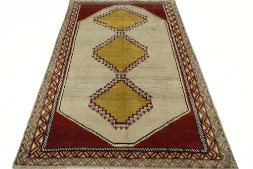 Surface texture of 2000s Persian Gabbeh rug with natural Wool and intricate pattern