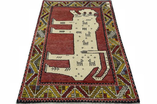 Surface texture of 2000s Persian Gabbeh rug with natural Wool and intricate pattern
