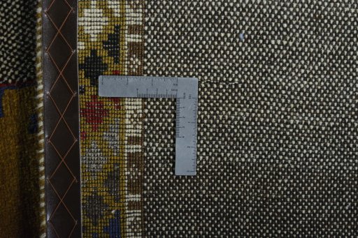 Close-up detail of 2000s Persian Gabbeh rug from Iran / Persia showing Wool weave