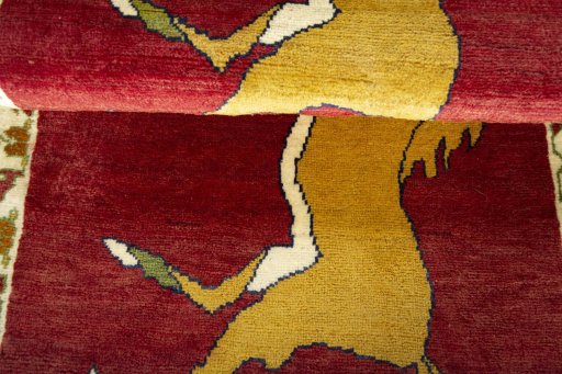 Full view of 2000s Persian Gabbeh rug from Iran / Persia, 181 × 87 cm in Red tones