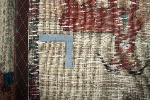 Close-up detail of 2000s Persian Gabbeh rug from Iran / Persia showing Wool weave