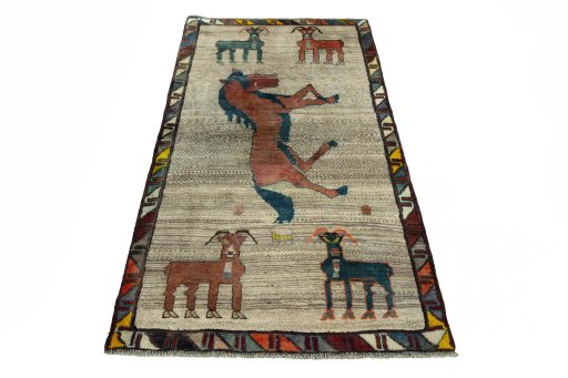 Surface texture of 2000s Persian Gabbeh rug with natural Wool and intricate pattern