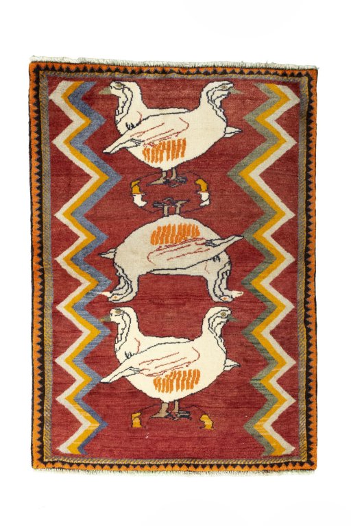 Full view of 2000s Persian Gabbeh rug from Iran / Persia, 142 × 100 cm in Red tones
