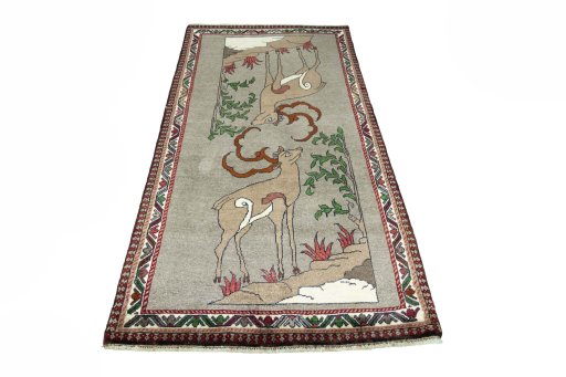 Surface texture of 2000s Persian Gabbeh rug with natural Wool and intricate pattern