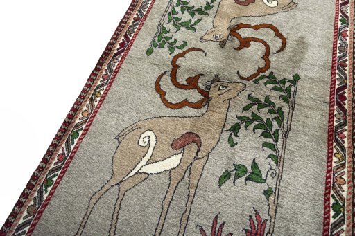 Backside of handmade 2000s Persian Gabbeh rug showing knot structure and weave density