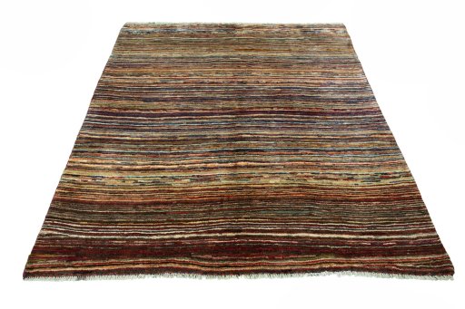 Surface texture of 2000s Persian Gabbeh rug with natural Wool and intricate pattern