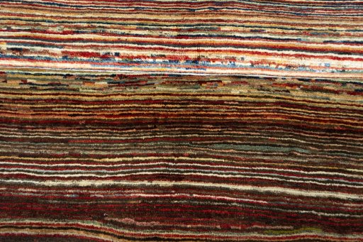 Full view of 2000s Persian Gabbeh rug from Iran / Persia, 185 × 155 cm in Multi Color tones
