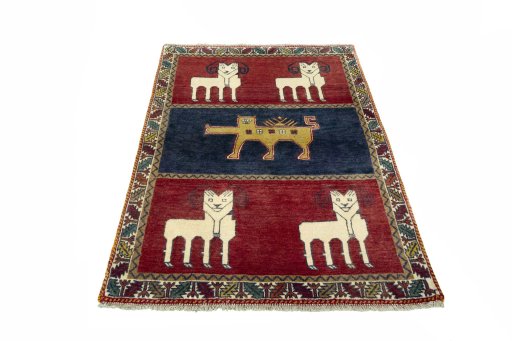 Surface texture of 2000s Persian Gabbeh rug with natural Wool and intricate pattern