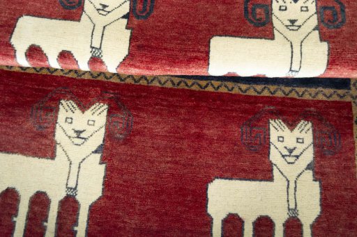 Full view of 2000s Persian Gabbeh rug from Iran / Persia, 155 × 110 cm in Red tones
