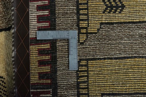 Close-up detail of 2000s Persian Gabbeh rug from Iran / Persia showing Wool weave