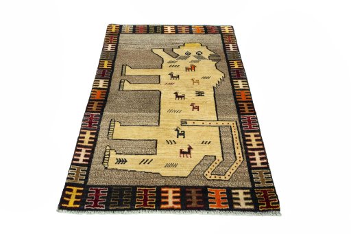 Surface texture of 2000s Persian Gabbeh rug with natural Wool and intricate pattern