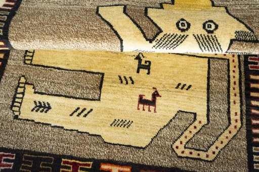 Full view of 2000s Persian Gabbeh rug from Iran / Persia, 150 × 100 cm in Brown tones