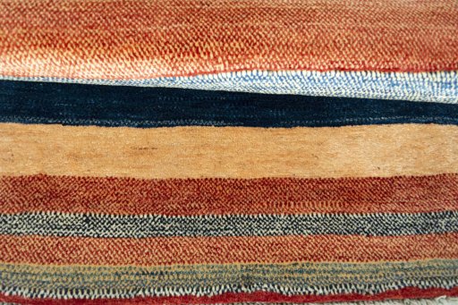 Full view of 2000s Persian Gabbeh rug from Iran / Persia, 143 × 90 cm in Multi Color tones