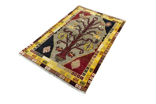 Corner detail of 2000s Persian Gabbeh rug showing border pattern and Wool pile