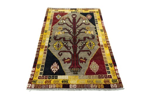 Surface texture of 2000s Persian Gabbeh rug with natural Wool and intricate pattern