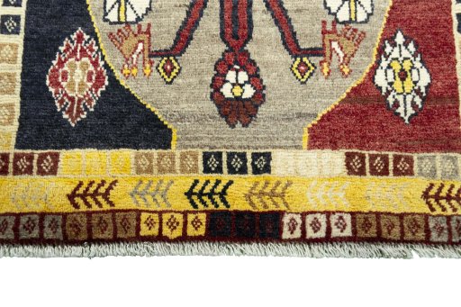 Central medallion detail of 2000s Persian Gabbeh rug from Iran / Persia