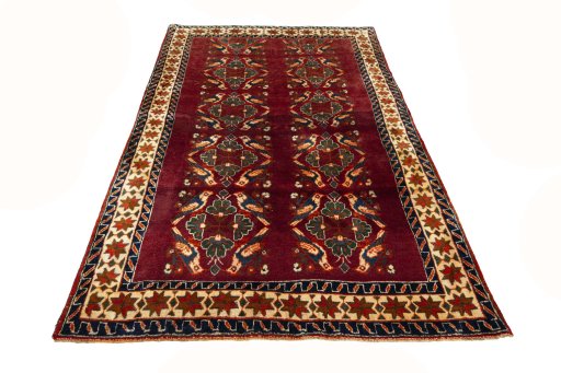 Surface texture of 2000s Persian Gabbeh rug with natural Wool and intricate pattern