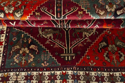 Corner detail of 2000s Persian Gabbeh rug showing border pattern and Wool pile