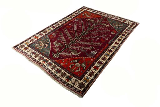 Corner detail of 2000s Persian Gabbeh rug showing border pattern and Wool pile