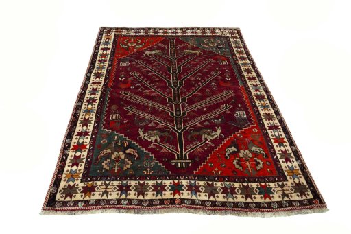 Surface texture of 2000s Persian Gabbeh rug with natural Wool and intricate pattern