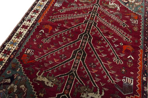 Backside of handmade 2000s Persian Gabbeh rug showing knot structure and weave density