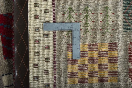 Close-up detail of 2000s Persian Gabbeh rug from Iran / Persia showing Wool weave