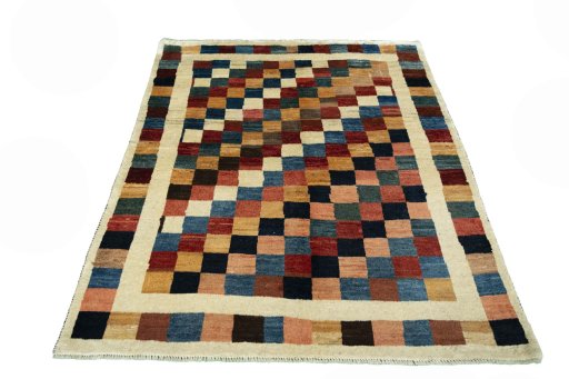 Surface texture of 2000s Persian Gabbeh rug with natural Wool and intricate pattern