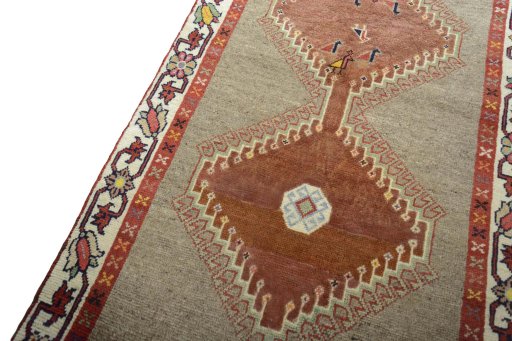 Backside of handmade 2000s Persian Gabbeh rug showing knot structure and weave density