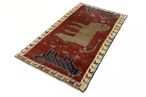 Corner detail of 2000s Persian Gabbeh rug showing border pattern and Wool pile