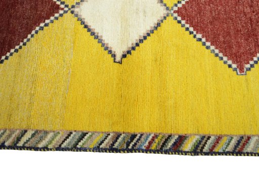 Close-up detail of 2000s Persian Gabbeh rug from Iran / Persia showing Wool weave