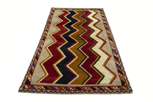 Surface texture of 2000s Persian Gabbeh rug with natural Wool and intricate pattern