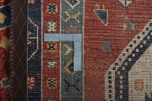 Close-up detail of 2000s Persian Gabbeh rug from Iran / Persia showing Wool weave