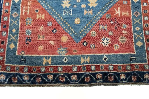 Central medallion detail of 2000s Persian Gabbeh rug from Iran / Persia