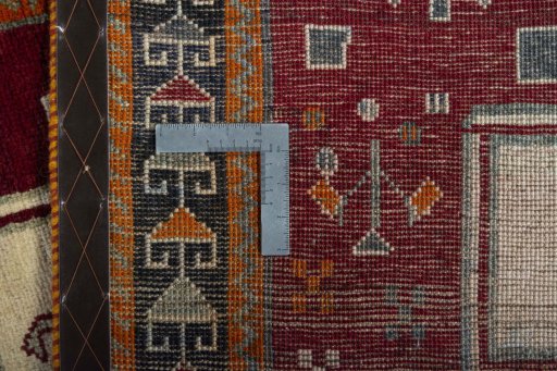 Close-up detail of 2000s Persian Gabbeh rug from Iran / Persia showing Wool weave