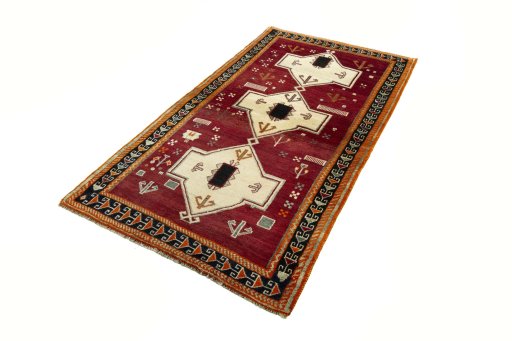 Corner detail of 2000s Persian Gabbeh rug showing border pattern and Wool pile