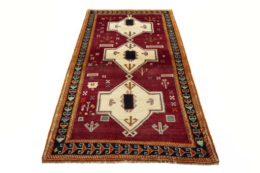 Surface texture of 2000s Persian Gabbeh rug with natural Wool and intricate pattern
