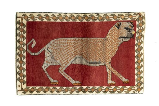 Full view of 2000s Persian Gabbeh rug from Iran / Persia, 155 × 100 cm in Red tones