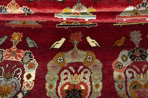 Full view of 2000s Persian Gabbeh rug from Iran / Persia, 244 × 150 cm in Red tones