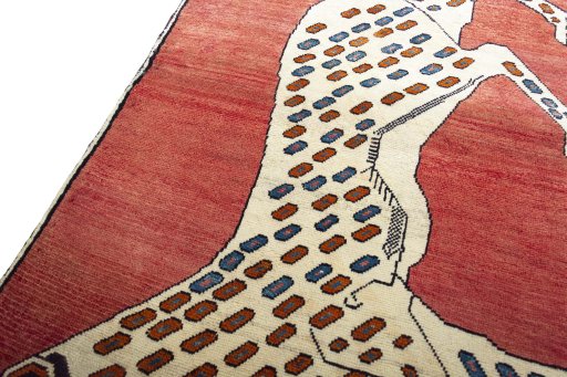 Backside of handmade 2000s Persian Gabbeh rug showing knot structure and weave density