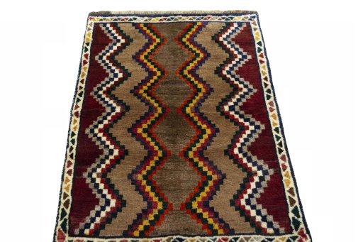 Surface texture of 2000s Persian Gabbeh rug with natural Wool and intricate pattern