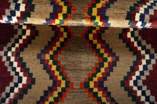 Full view of 2000s Persian Gabbeh rug from Iran / Persia, 118 × 83 cm in Multi Color tones