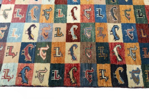 Close-up detail of 2000s Persian Gabbeh rug from Iran / Persia showing Wool weave